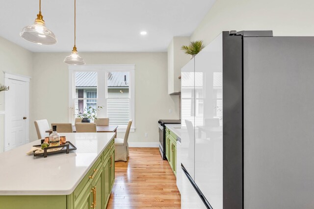5107 Beulah Ave, Chattanooga, TN 37409 - kitchen featuring light wood-type flooring, green cabinets, stainless steel appliances, light countertops, and recessed lighting