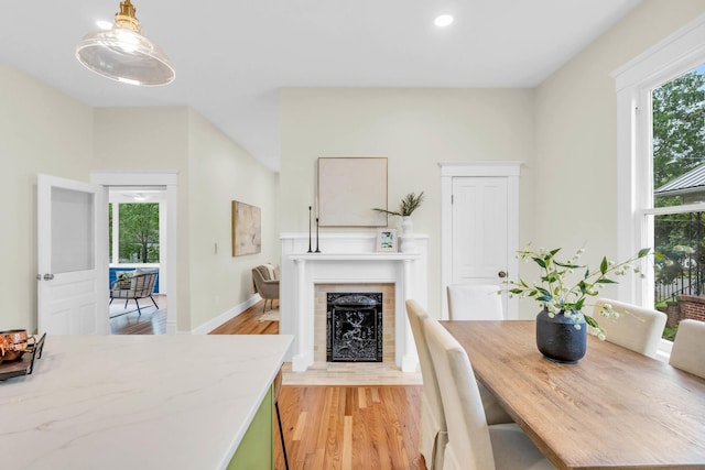 5107 Beulah Ave, Chattanooga, TN 37409 - dining room with a fireplace, light wood-style flooring, baseboards, and recessed lighting