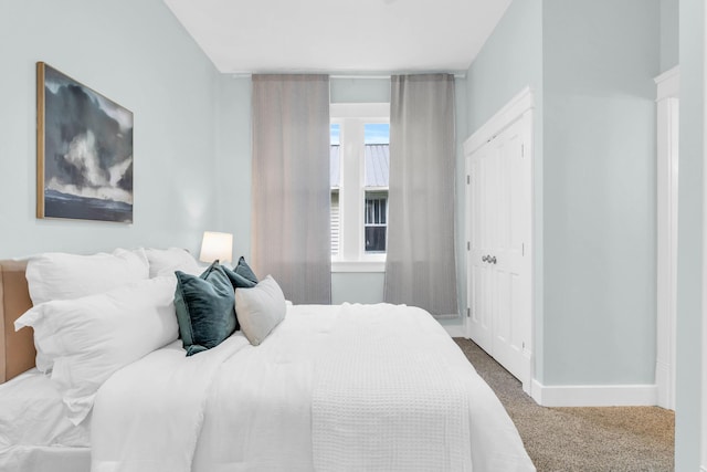 5107 Beulah Ave, Chattanooga, TN 37409 - carpeted bedroom with baseboards and a closet