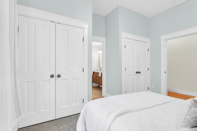 5107 Beulah Ave, Chattanooga, TN 37409 - bedroom featuring baseboards, ensuite bathroom, and light carpet