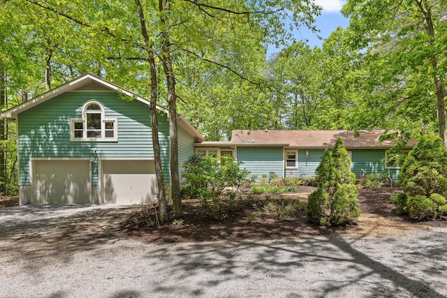 view of front of property with an attached garage and driveway