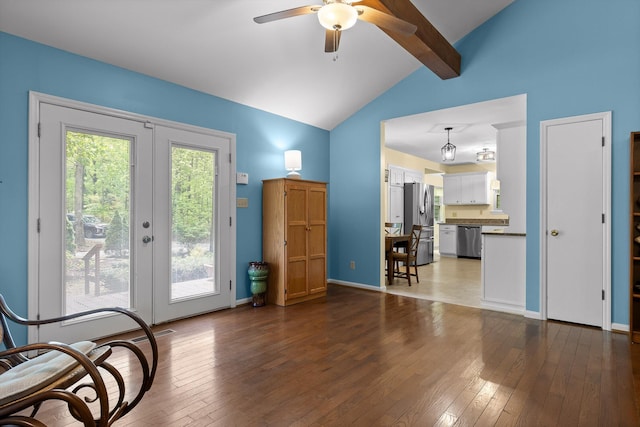 interior space featuring french doors, ceiling fan, hardwood / wood-style flooring, and beamed ceiling