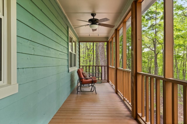 sunroom / solarium with ceiling fan
