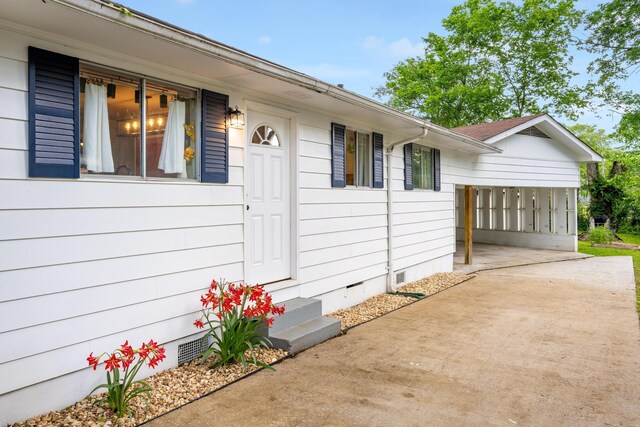 5407 Marion Ave, Chattanooga, TN 37412 - view of side of home featuring crawl space, entry steps, and driveway