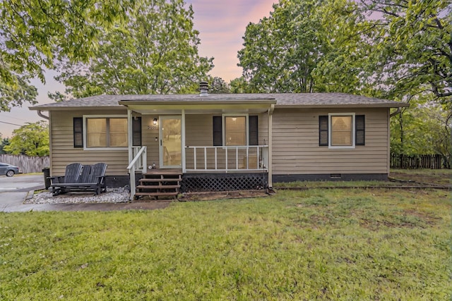 2031 Millard Rd, Soddy Daisy, TN 37379 - view of front of property with covered porch, fence, crawl space, roof with shingles, and a front lawn