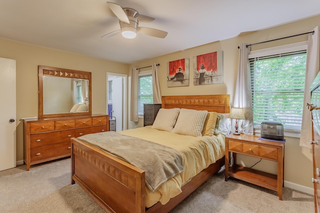 2031 Millard Rd, Soddy Daisy, TN 37379 - bedroom with light colored carpet, a ceiling fan, and baseboards