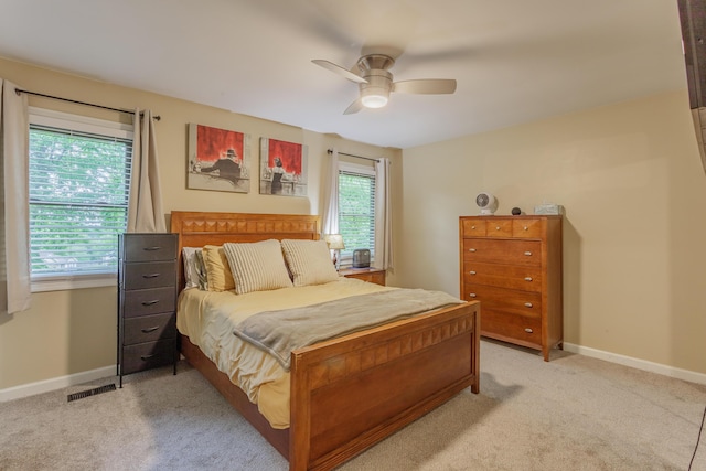 2031 Millard Rd, Soddy Daisy, TN 37379 - bedroom with light colored carpet, ceiling fan, visible vents, and baseboards