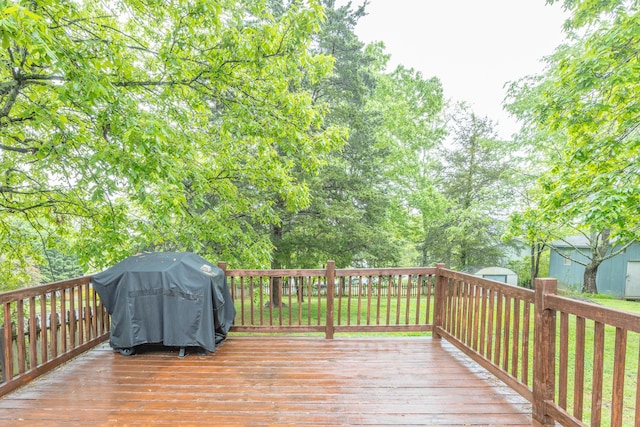 2031 Millard Rd, Soddy Daisy, TN 37379 - wooden deck with a storage unit, an outdoor structure, and area for grilling