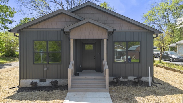 view of front of house with crawl space
