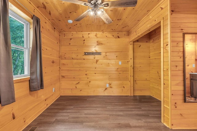 144 Hambright Rd, Reliance, TN 37369 - spare room with wood ceiling, wood finished floors, wooden walls, and a ceiling fan