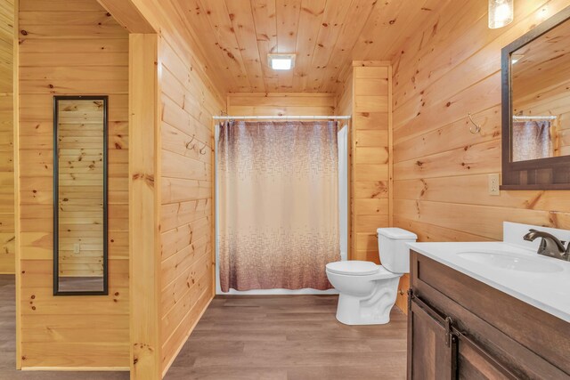 144 Hambright Rd, Reliance, TN 37369 - bathroom with wooden ceiling, wooden walls, toilet, wood finished floors, and vanity