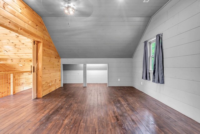 144 Hambright Rd, Reliance, TN 37369 - bonus room with wooden walls, a ceiling fan, vaulted ceiling, and dark wood finished floors