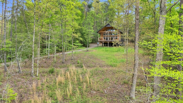 144 Hambright Rd, Reliance, TN 37369 - view of yard featuring a deck and a wooded view