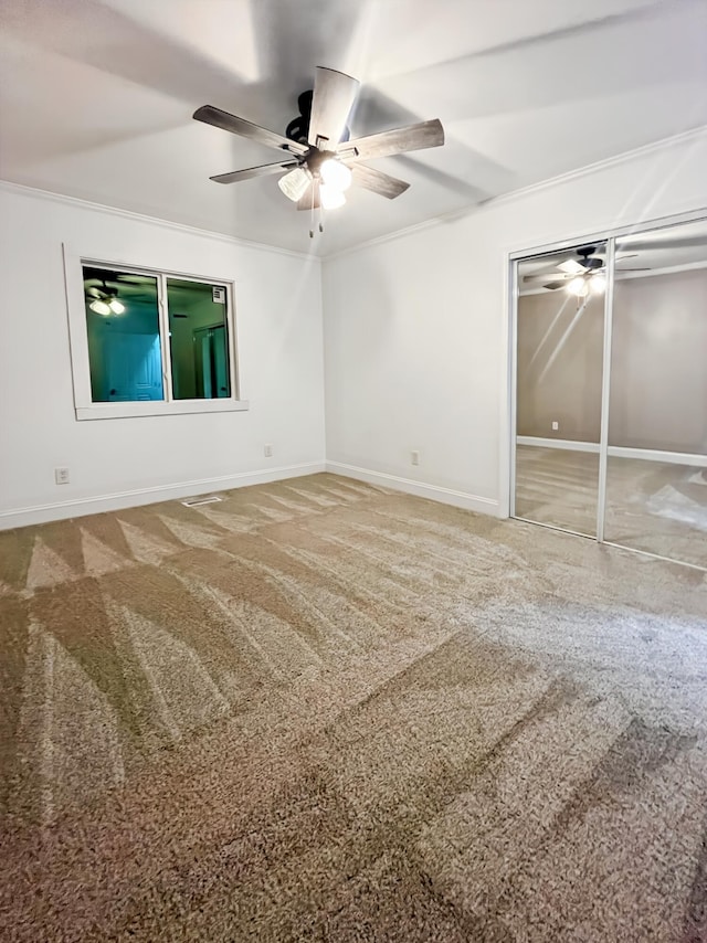 1157 Boy Scout Rd, Hixson, TN 37343 - unfurnished bedroom with carpet floors, ornamental molding, a closet, and a ceiling fan