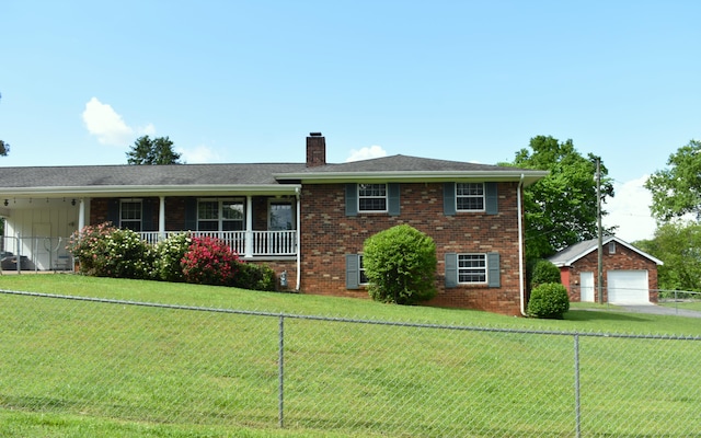 view of front of property featuring a front lawn, fence private yard, brick siding, and a chimney