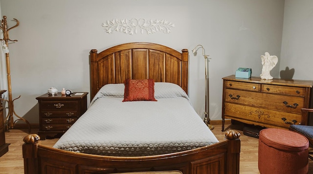bedroom featuring light wood-style flooring