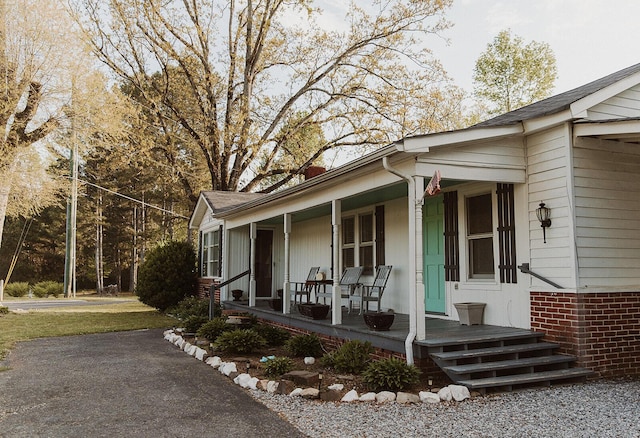 view of home's exterior with a porch