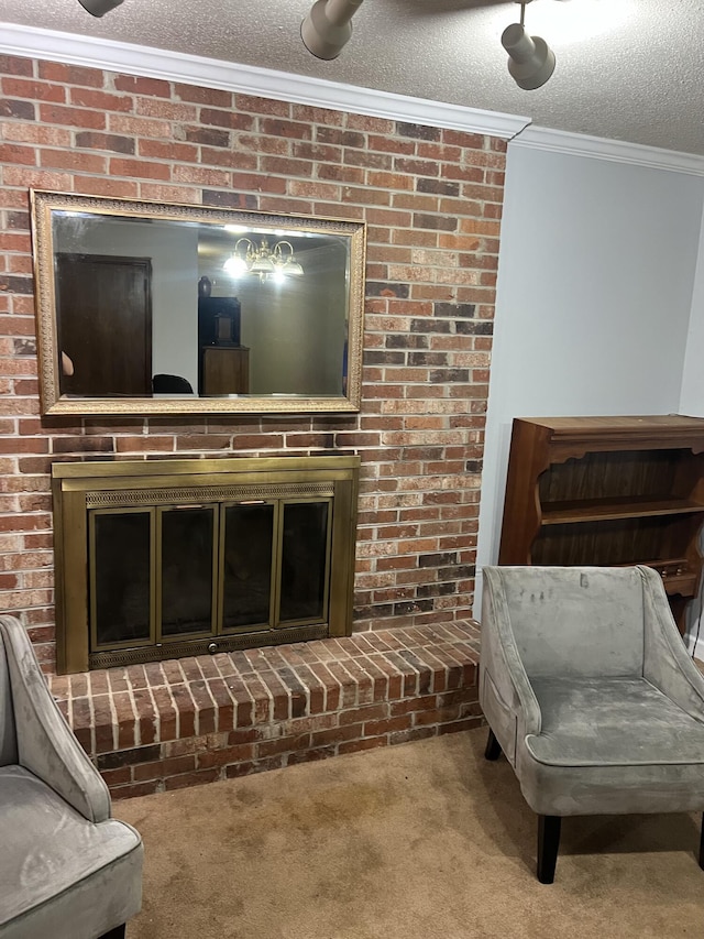 2288 Edgmon Forest Ln, Chattanooga, TN 37421 - carpeted living area featuring ornamental molding, a fireplace, and a textured ceiling