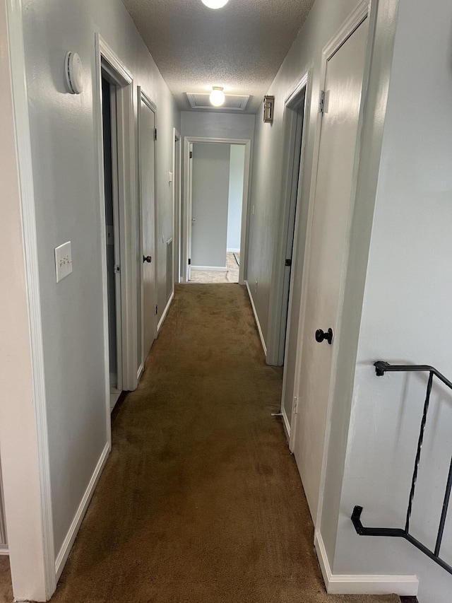 2288 Edgmon Forest Ln, Chattanooga, TN 37421 - hall with a textured ceiling, carpet flooring, and attic access
