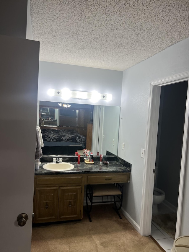 2288 Edgmon Forest Ln, Chattanooga, TN 37421 - bathroom with vanity and a textured ceiling