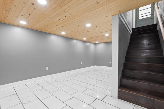 stairs featuring recessed lighting, baseboards, wooden ceiling, and marble finish floor