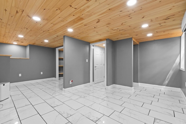 unfurnished room featuring baseboards, wood ceiling, recessed lighting, and marble finish floor