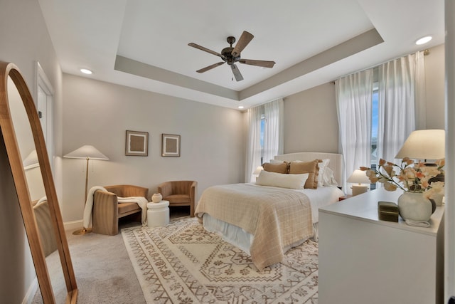 5812 Acadia Dr, Chattanooga, TN 37415 - bedroom with light colored carpet, a raised ceiling, baseboards, recessed lighting, and ceiling fan