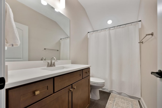 5812 Acadia Dr, Chattanooga, TN 37415 - bathroom featuring toilet, vanity, vaulted ceiling, and shower / bathtub combination with curtain