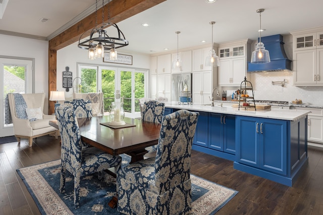 dining room with dark wood-style flooring, visible vents, recessed lighting, and a notable chandelier