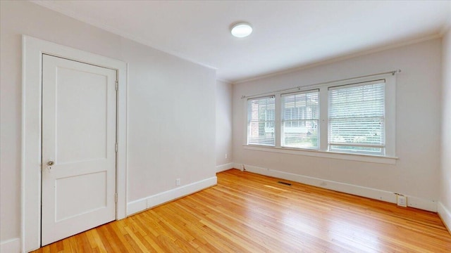 159 Gardner St, Chattanooga, TN 37411 - spare room with plenty of natural light, crown molding, and light wood-type flooring