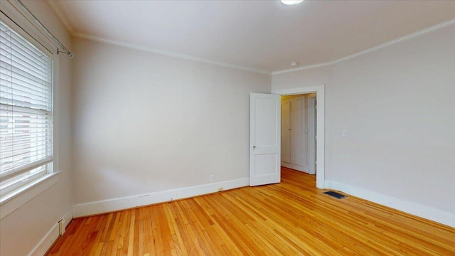 159 Gardner St, Chattanooga, TN 37411 - spare room featuring crown molding, baseboards, visible vents, and light wood finished floors