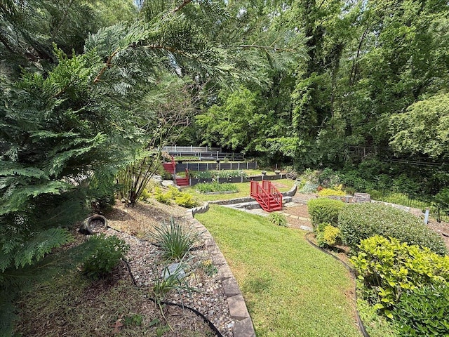 159 Gardner St, Chattanooga, TN 37411 - view of yard with a view of trees, a garden, and fence