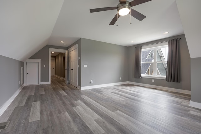 2419 Welch Rd, Soddy Daisy, TN 37379 - additional living space featuring visible vents, a ceiling fan, wood finished floors, and vaulted ceiling