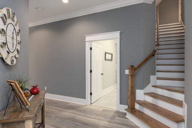2419 Welch Rd, Soddy Daisy, TN 37379 - foyer entrance with recessed lighting, ornamental molding, stairs, and wood finished floors