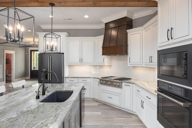 2419 Welch Rd, Soddy Daisy, TN 37379 - kitchen with a notable chandelier, a sink, visible vents, ornamental molding, and black appliances
