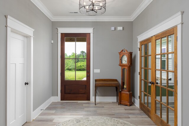 2419 Welch Rd, Soddy Daisy, TN 37379 - entryway featuring plenty of natural light, visible vents, french doors, and an inviting chandelier