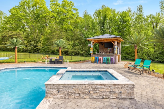 2419 Welch Rd, Soddy Daisy, TN 37379 - view of swimming pool featuring outdoor dry bar, a fenced backyard, a fenced in pool, an in ground hot tub, and a patio
