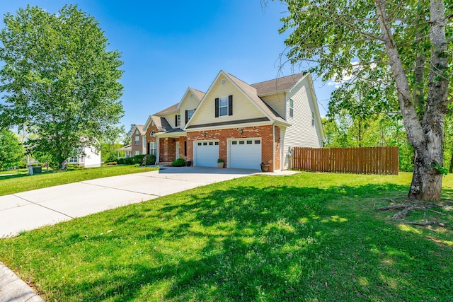 view of front of property with a front yard, driveway, brick siding, an attached garage, and fence