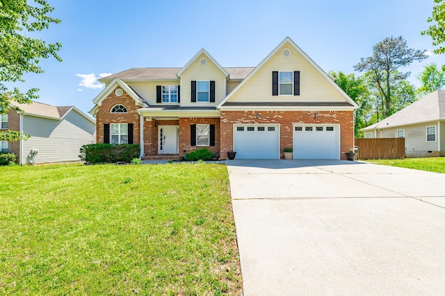 view of front of house featuring brick siding, fence, a garage, driveway, and a front lawn