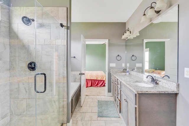 2835 Fernleaf Ln, Chattanooga, TN 37421 - ensuite bathroom with connected bathroom, double vanity, a sink, and a stall shower