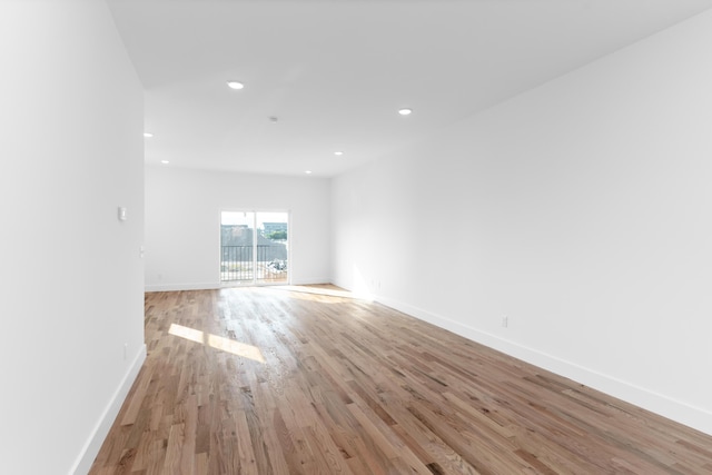 943 Montague Pl, Chattanooga, TN 37408 - unfurnished room with baseboards, recessed lighting, and light wood-style floors
