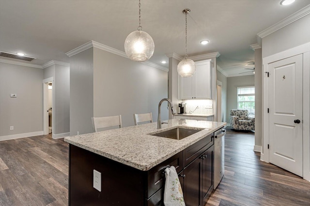 4130 Inlet Loop, Chattanooga, TN 37416 - kitchen featuring a sink, crown molding, recessed lighting, dark wood-type flooring, and light stone countertops