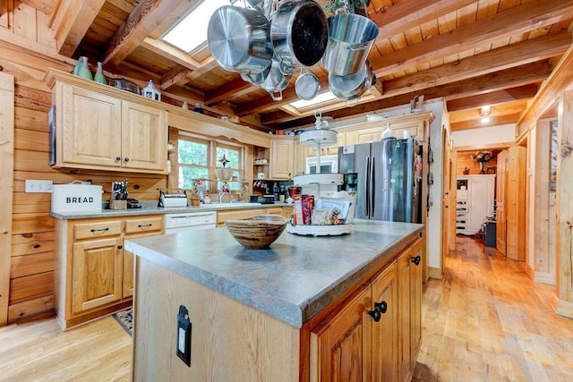 kitchen with a kitchen island, white appliances, beamed ceiling, wooden ceiling, and light wood-style flooring