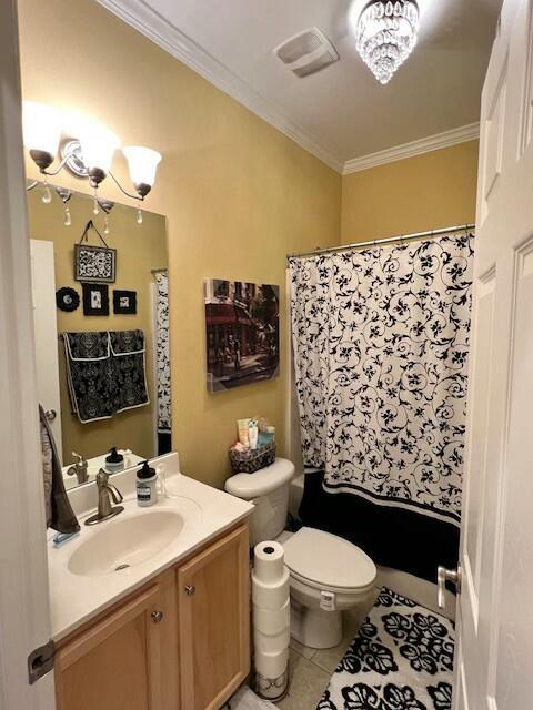 full bath with visible vents, toilet, ornamental molding, vanity, and tile patterned flooring