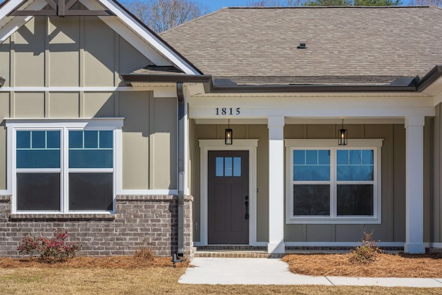 4644 Signal Forest Dr Unit 7, Signal Mountain, TN 37377 - property entrance featuring roof with shingles, board and batten siding, and brick siding