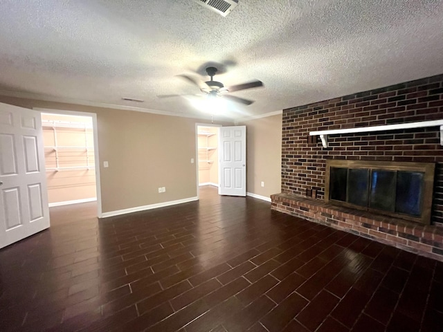 unfurnished living room featuring baseboards, visible vents, ceiling fan, and a textured ceiling