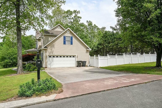 view of property exterior with a lawn, fence, concrete driveway, and a garage