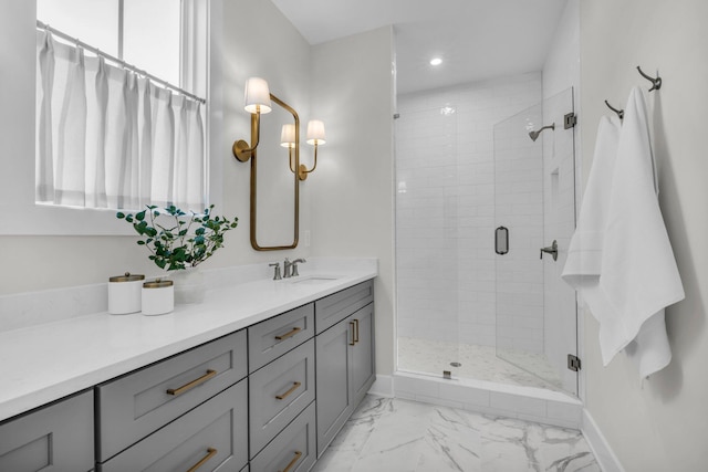 bathroom featuring a shower stall, baseboards, recessed lighting, vanity, and marble finish floor