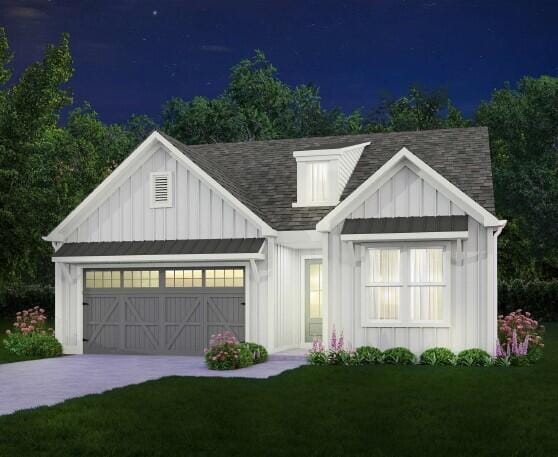 modern farmhouse style home with board and batten siding, an attached garage, a shingled roof, driveway, and a lawn