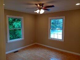 empty room featuring a ceiling fan, baseboards, and recessed lighting